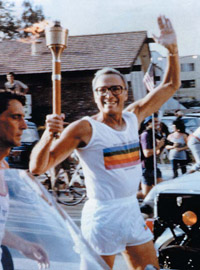 Al Dorman carries the Olympic torch