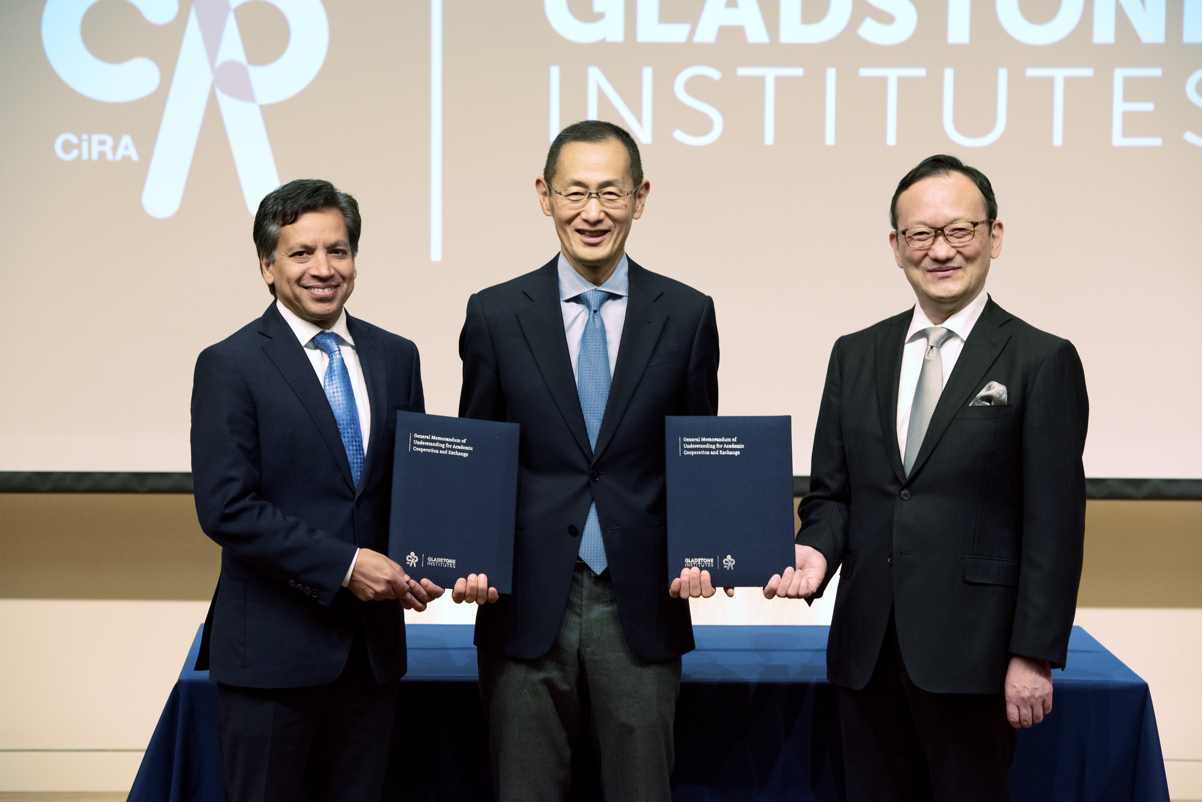 Deepak Srivastava, Shinya Yamanaka, and Consul General of Japan Tomochika Uyama after the signing ceremony