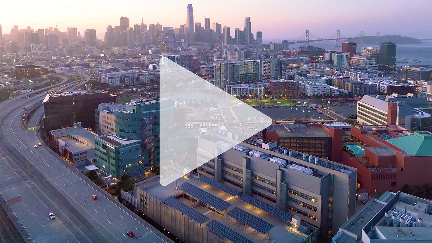 Gladstone building with San Francisco cityscape in background