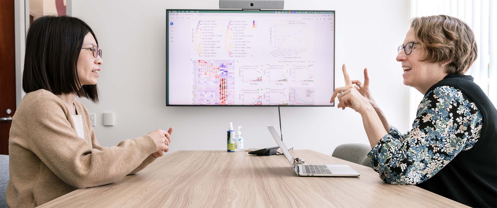 Katie Pollard, seen here talking to Zhirui Hu