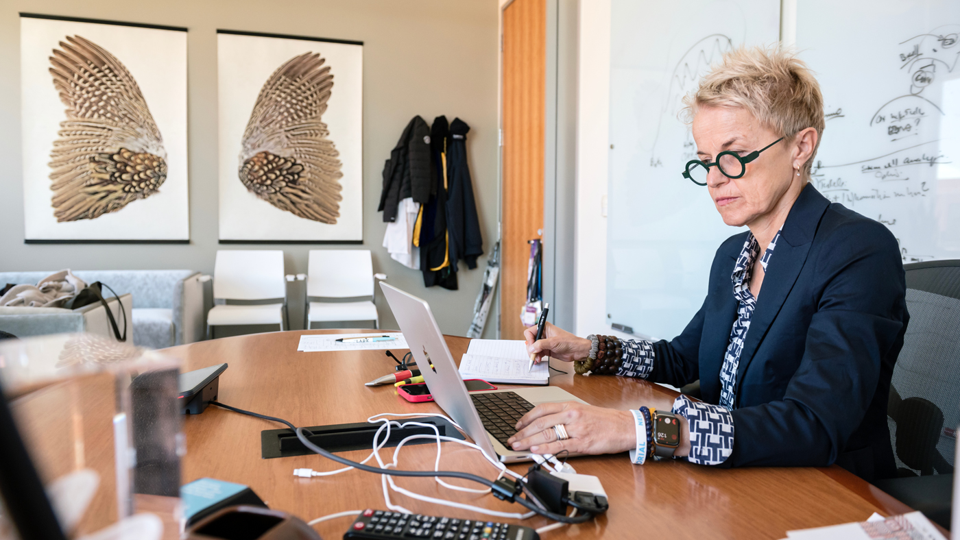 Melanie Ott working in her office at Gladstone Institutes