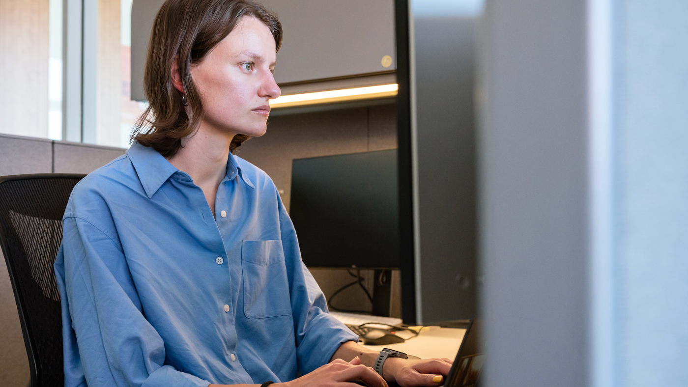 Emma Dann at her computer