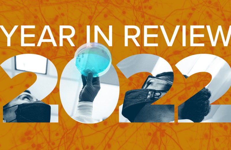 Cover Image for Gladstone&#039;s 2022 Year in Review featuring the title styled with researchers and microscopy of human cells