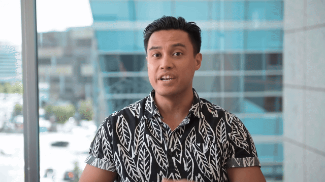 GIF of Kevin Pastores sitting in front of large windows at Gladstone Institutes