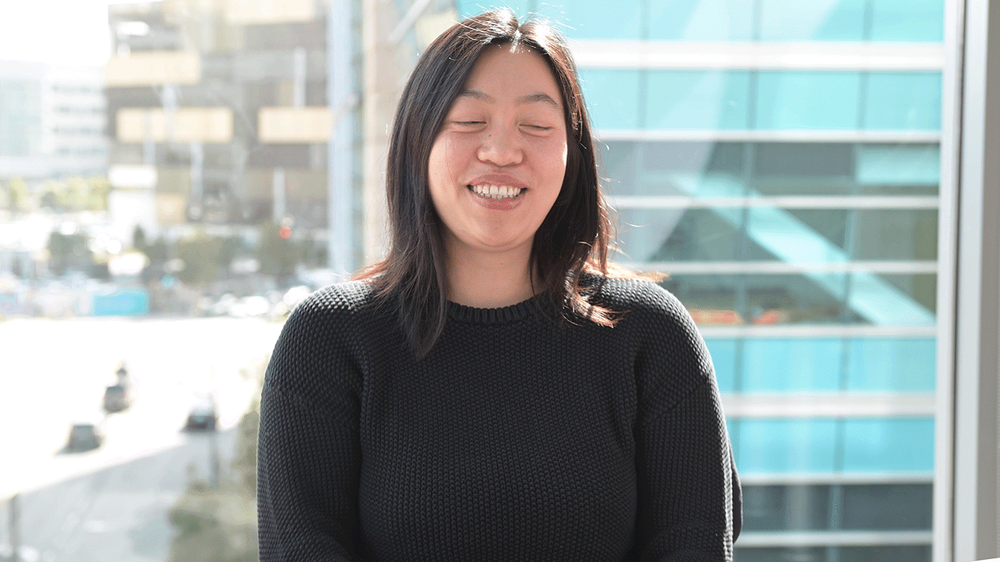 Animation of Ada Zhu sitting in an office at Gladstone Institutes