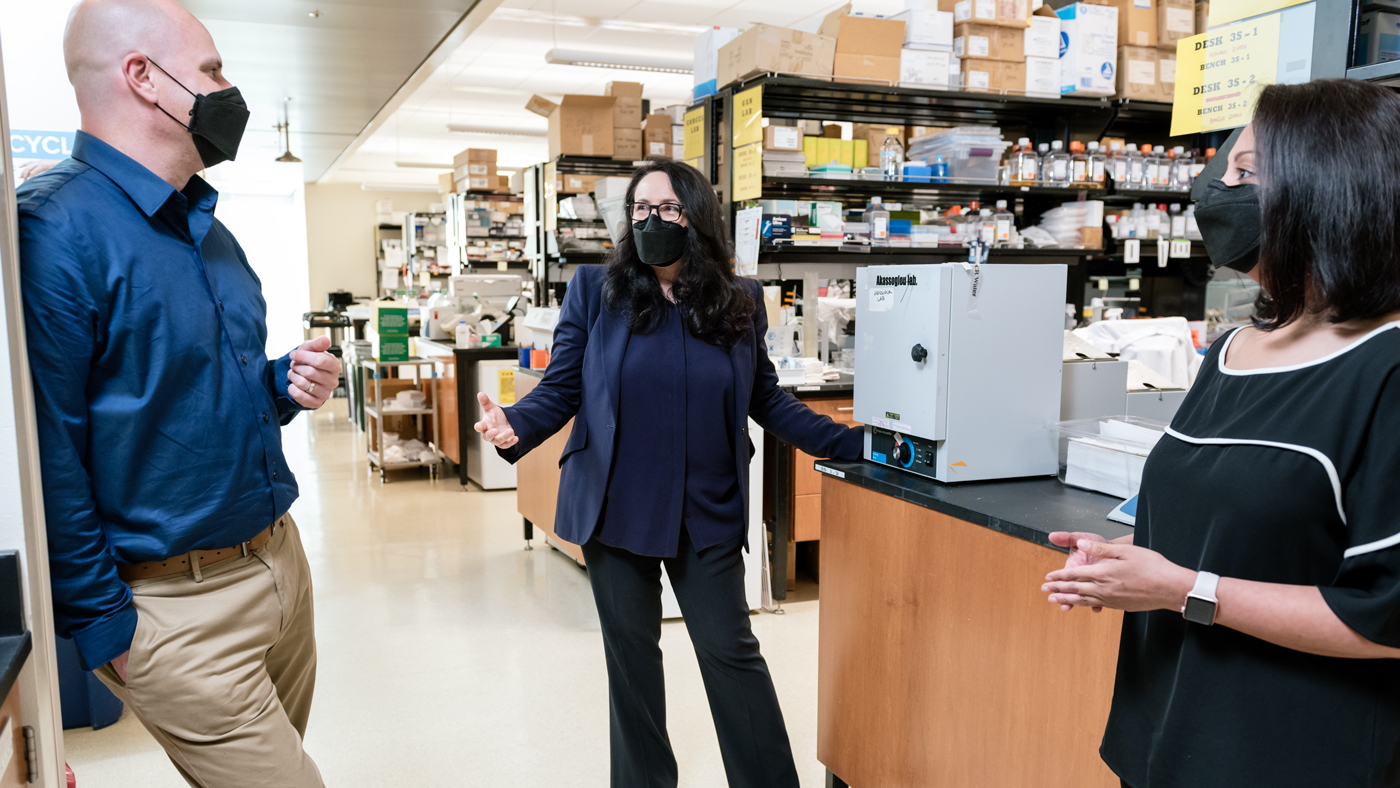 Mark Petersen, Katerina Akassoglou, and Reshmi Tognatta in the lab at Gladstone