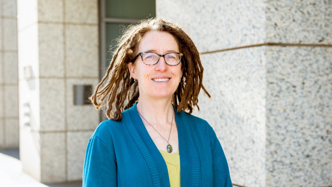 Kathrine Pollard poses outside the Gladstone Institutes building