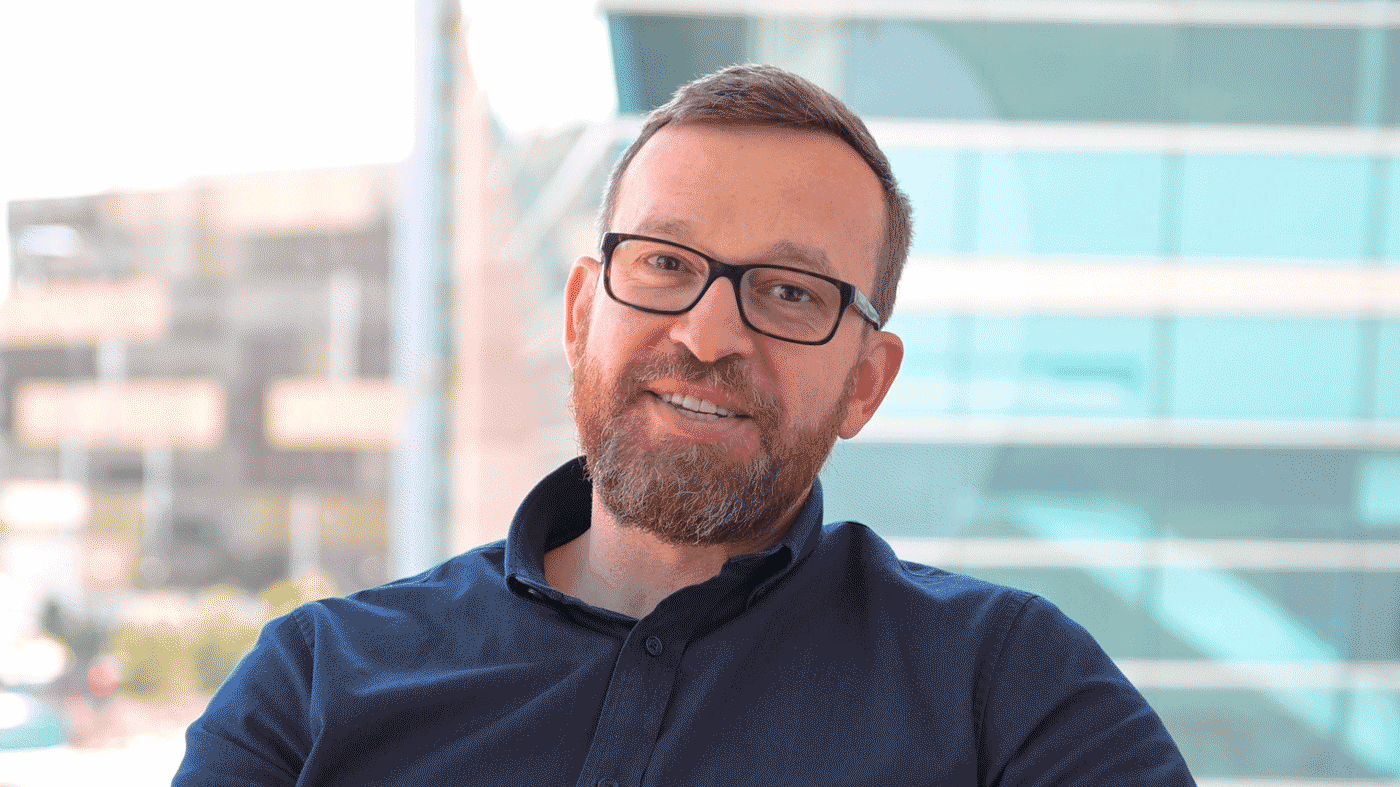 GIF of Misha Zilberter speaking during an interview