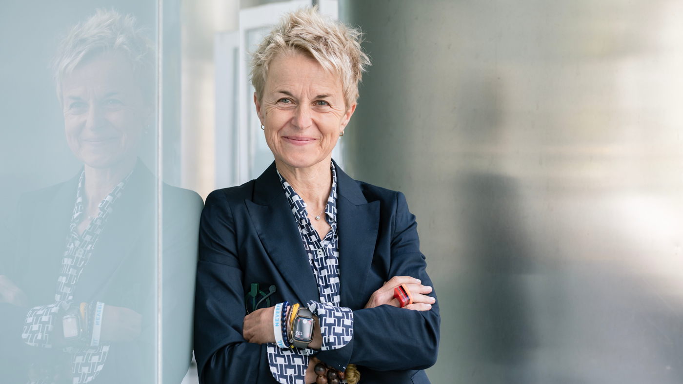 Headshot of Melanie Ott posing outside Gladstone Institutes